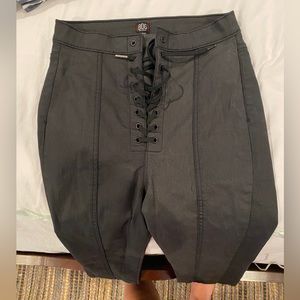 Coated lace up high waisted jeans